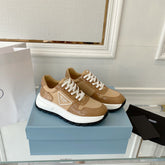PRADA 25S THICK SOLE SNEAKER IN BROWN CALFSKIN AND CANVAS