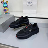 PRADA 25S SNEAKERS IN BLACK CALFSKIN