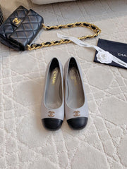 PUMP ROUNG TOE IN SLATE GREY MIX BLACK SHEEPSKIN