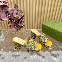 HORSEBIT SLIDE SANDAL IN TUSCANY YELLOW MONOGRAM CANVAS AND SHEEPSKIN LINING