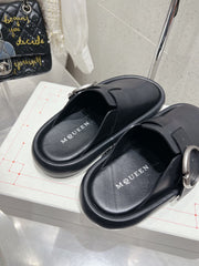 ARC CLOG MULES IN BLACK CALFSKIN