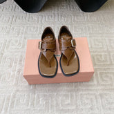 THONG SANDALS IN RUSSET BROWN SHINY LAMBSKIN WITH SILVER BUCKLE