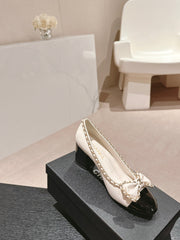 BOWKNOT HIGH HEELS IN WHITE MIX BLACK SHEEPSKIN