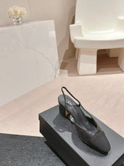 HIGH SLINGBACKS IN BLACK LAMBSKIN AND SATIN