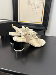 MID HEEL SANDALS IN WHITE CALFSKIN WITH BOW