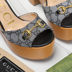 GG HORSEBIT WEDGE SANDAL IN BLACK MONOGRAM JACQUARD FABRIC AND SHEEPSKIN LINING