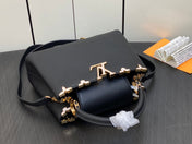CAPUCINES BB 27 BLACK TAURILLON GOLD HARDWARE