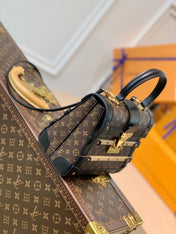 TRIANON PM 21 IN BROWN MONOGRAM COATED CANVAS AND BLACK CALFSKIN SIGNATURE S-LOCK