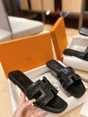 0RAN SANDALS IN BLACK CALFSKIN AND CANVAS