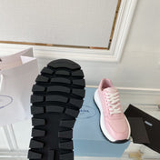 PRADA 25S THICK SOLE SNEAKER IN LIGHT PINK CALFSKIN AND CANVAS
