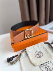BOUCLE BELT BUCKLE & REVERSIBLE GINGER ORANGE AND BLACK LEATHER STRAP 38MM GOLD HARDWARE
