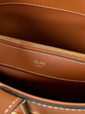 TRIOMPHE 25 BUCKET BAG CINNAMON BROWN CALFSKIN
