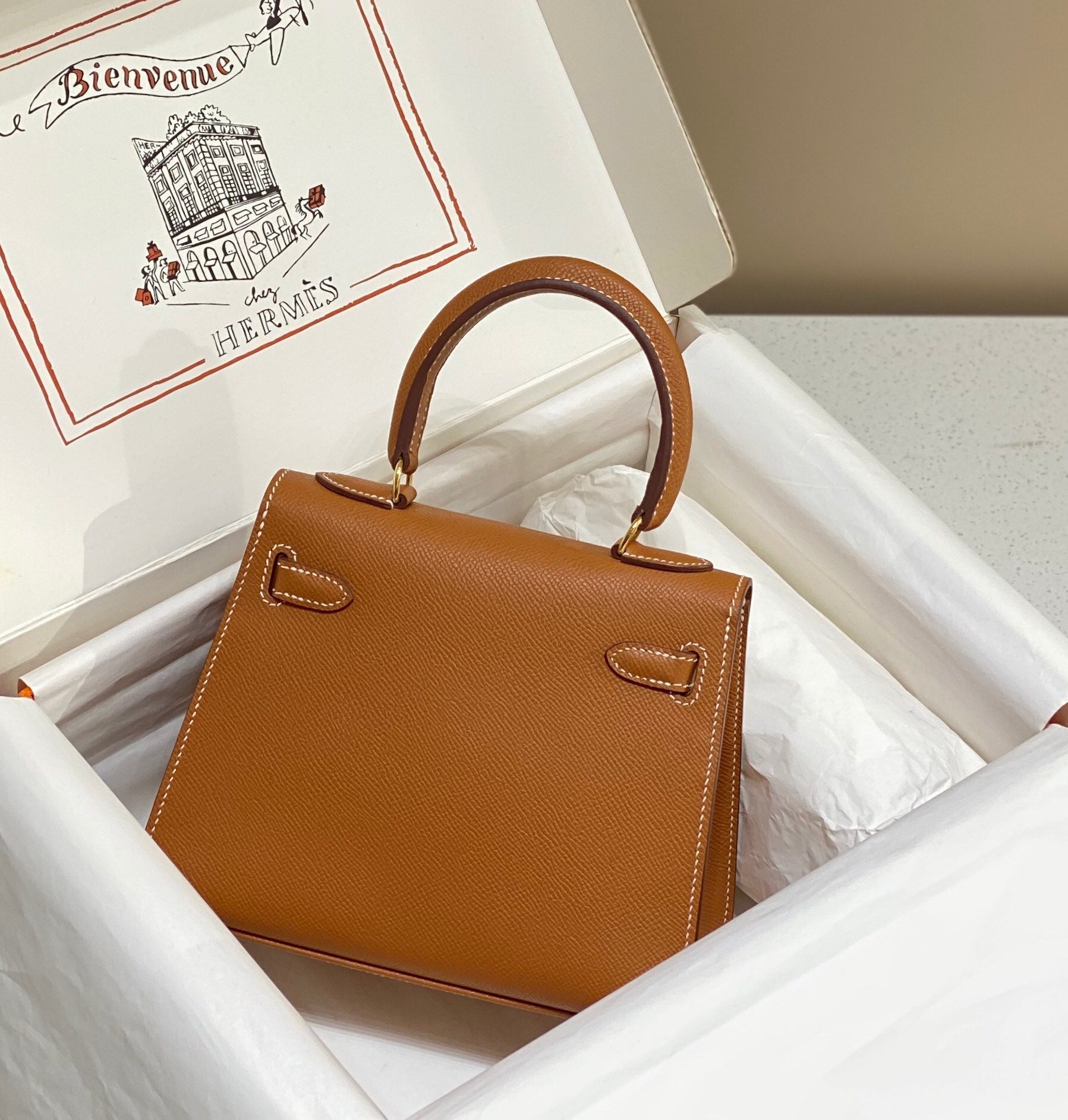 KELLY MINI 20 BAG IN BRONZE BROWN CALFSKIN WITH GOLD HARDWARE