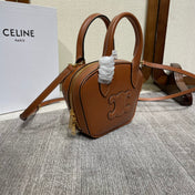 TRIOMPHE TOP HANDLE BAG 20 IN BRONZE BROWN CALFSKIN