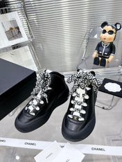 CC CANO ALTO SNEAKER IN BLACK CALFSKIN AND RUBBER