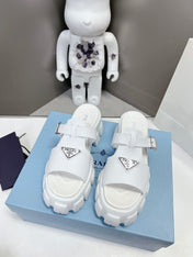 MONOLITH SLIPPER SANDALS IN WHITE RUBBER