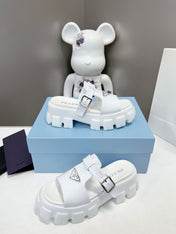 MONOLITH SLIPPER SANDALS IN WHITE RUBBER