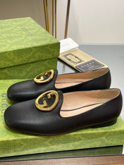 BLONDIE LOGO-PLAQUE LOAFERS IN BLACK CALFSKIN WITH GOLD HARDWARE