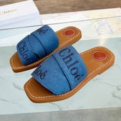 WOODY MULE IN COBALT BLUE DENIM WITH EMBROIDERED LOGO