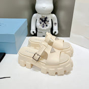 MONOLITH SLIPPER SANDALS IN BEIGE RUBBER