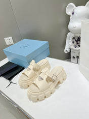 MONOLITH SLIPPER SANDALS IN BEIGE RUBBER