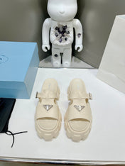 MONOLITH SLIPPER SANDALS IN BEIGE RUBBER