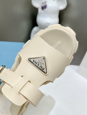 MONOLITH SLIPPER SANDALS IN BEIGE RUBBER