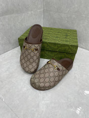 MULE WITH GOLD HORSEBIT IN BEIGE AND EBONY MONOGRAM CANVAS