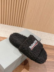 FURRY SLIDES IN BLACK CURLY SHEARLING