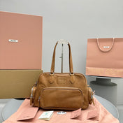BIKER BAG 31 IN CARAMEL BROWN CALFSKIN