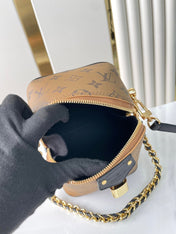 JUST IN CASE 14 IN BROWN MONOGRAM REVERSE CANVAS GOLD HARDWARE