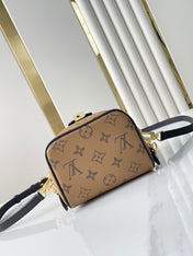 JUST IN CASE 14 IN BROWN MONOGRAM REVERSE CANVAS GOLD HARDWARE