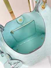 CARMEL 40 IN SKY BLUE MONOGRAM PERFORATED CALFSKIN