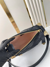 SIDE TRUNK 21 IN BLACK LAMBSKIN WITH CRISS CROSS PATTERN GOLD HARDWARE