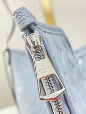 CARRYALL PM 29 IN BEAU BLUE MONOGRAM EMPREINTE LEATHER