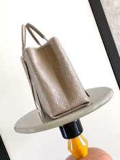 BABYLONE TOTE MM 39 IN TOURTERELLE MONOGRAM EMPREINTE LEATHER