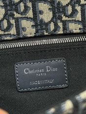 MONTAIGNE EAST-WEST BAG 24 IN BLACK LAMBSKIN AND MONOGRAM OBLIQUE JACQUARD