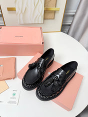 MIUMIU 26S TASSEL LOAFERS IN BLACK CALFSKIN