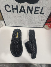 CHANEL 26S QUILTED SLIDE SANDALS IN BLACK CALFSKIN