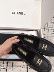SLINGBACK LOAFER IN BLACK CALFSKIN AND SHEARLING