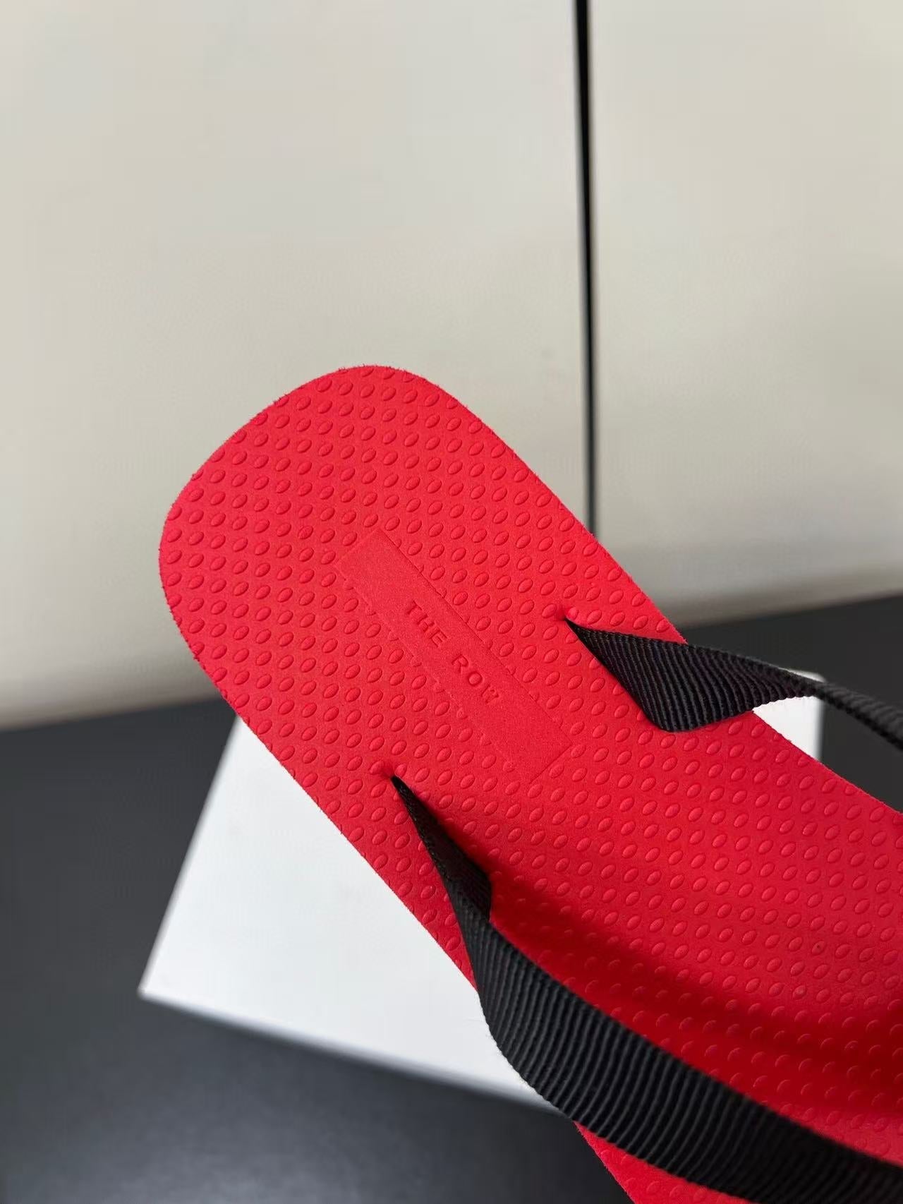THE ROW THICK-SOLED FLIP FLOPS IN RED RUBBER