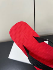 THE ROW THICK-SOLED FLIP FLOPS IN RED RUBBER