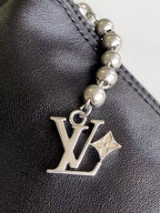 LV SHOULDER BAG 48 IN BLACK CALFSKIN EMBOSSED STRAP