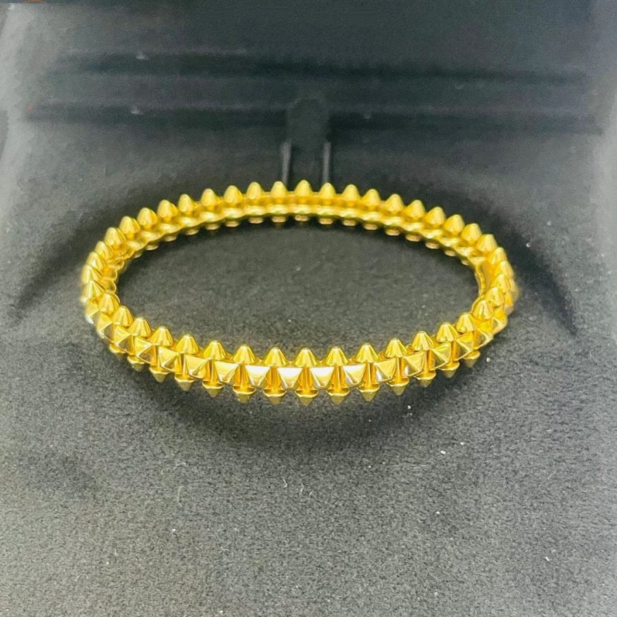 cartier-clash-de-cartier-bracelet-medium-model-yellow-gold-CORAL-3-900x900_01b1091b-af7a-4355-9da3-1c25dc17672e.jpg