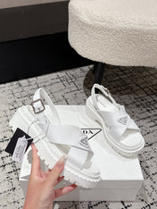 PRADA 25S CRISSCROSS SANDALS IN WHITE CALFSKIN LOGO