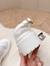 PRADA 25S CRISSCROSS SANDALS IN WHITE CALFSKIN