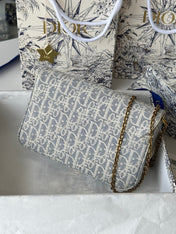 DIOR 25S MEDIUM SADDLE POUCH WITH CHAIN 21 IN LIGHT BLUE DIOR OBLIQUE JACQUARD CANVAS