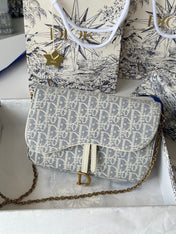 DIOR 25S MEDIUM SADDLE POUCH WITH CHAIN 21 IN LIGHT BLUE DIOR OBLIQUE JACQUARD CANVAS