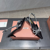 MIUMIU 26S SLINGBACK 55MM IN BLACK AND WHITE CALFSKIN WITH BOW