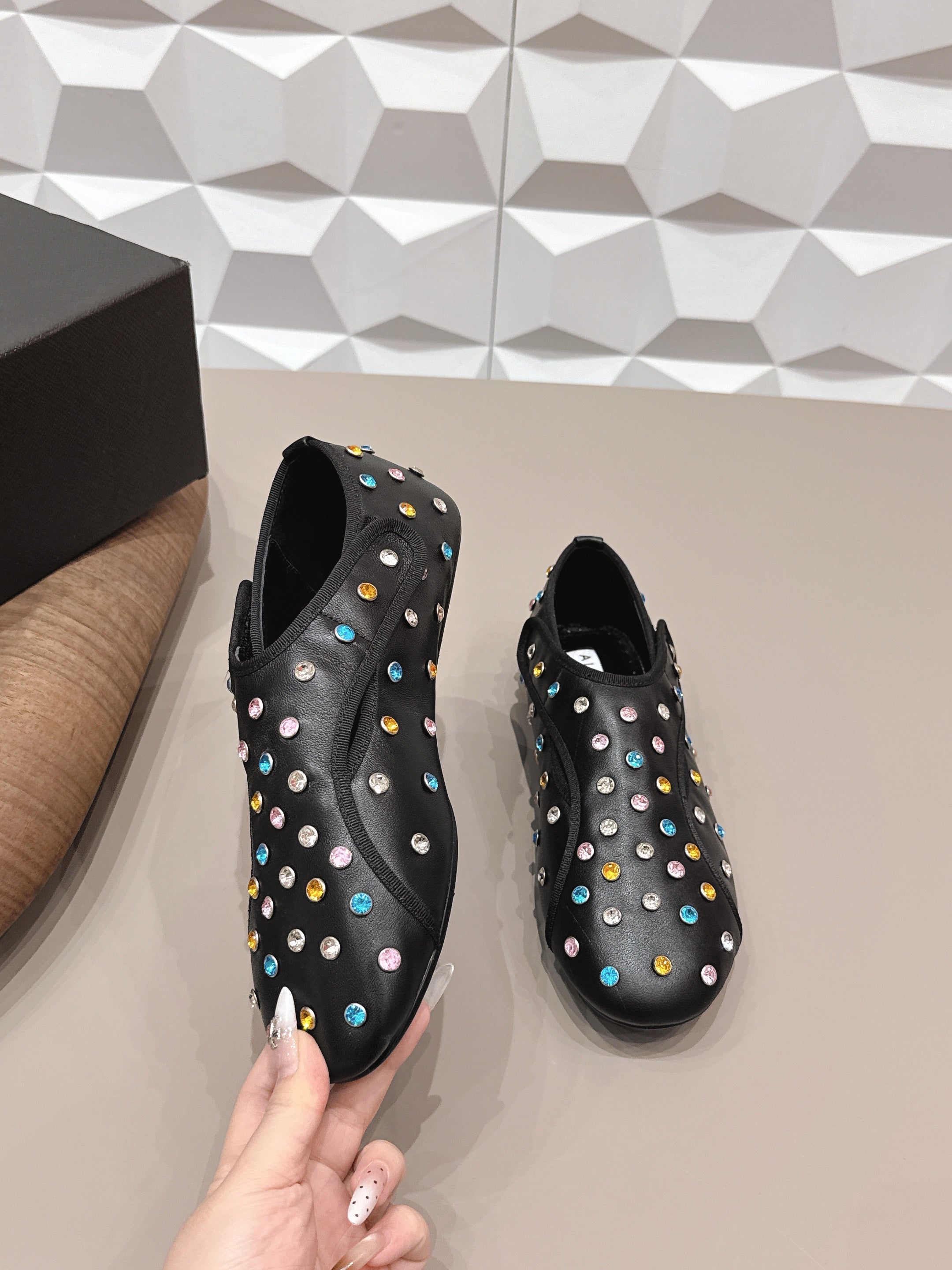 ALAIA 26S EMBELLISHED FLATS IN BLACK LAMBSKIN